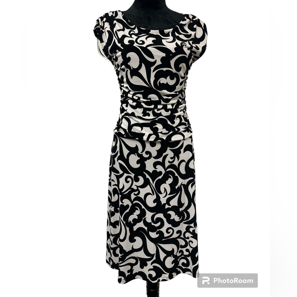 Black and white en focus studio mid length dress